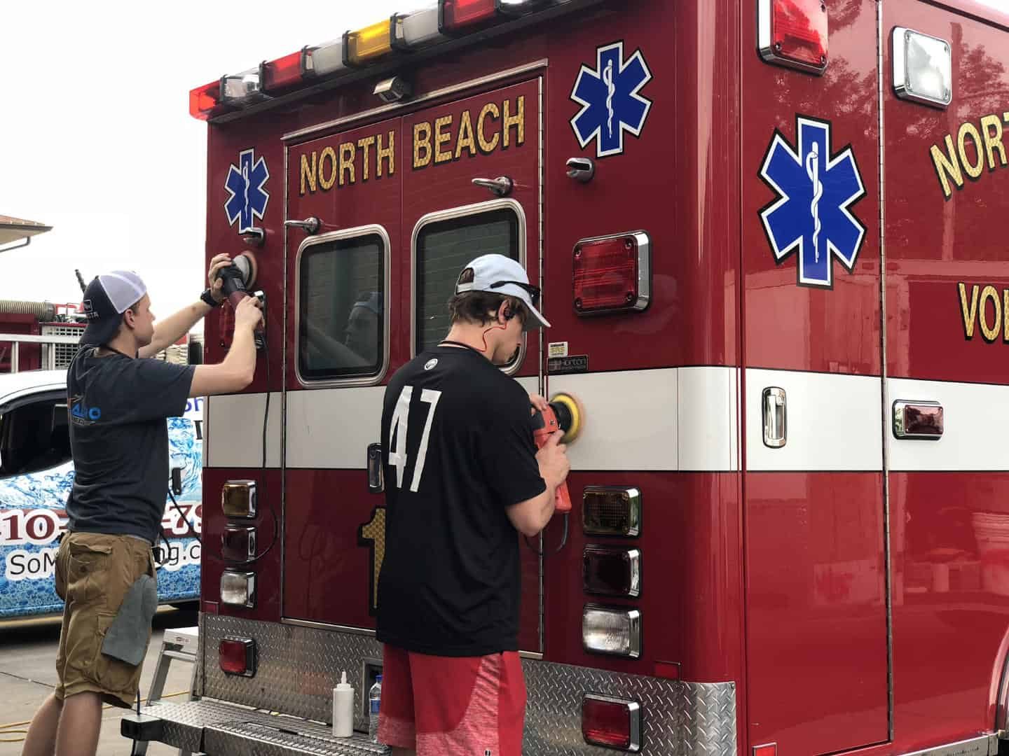 Shine Right detailers machine polishing a North Beach ambulance