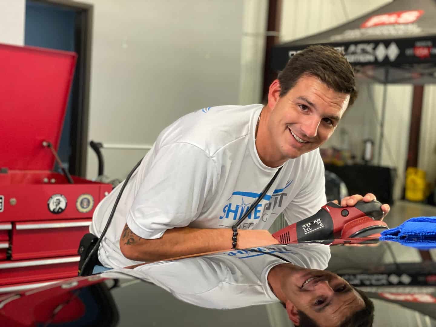 Founder Josh Buckler polishing a panel with a Flex polisher