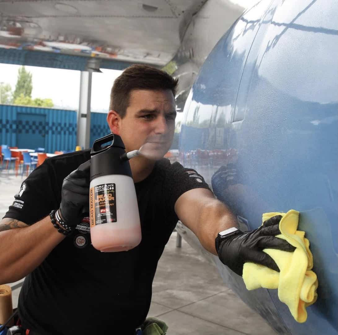 Josh Buckler polishing an aircraft panel